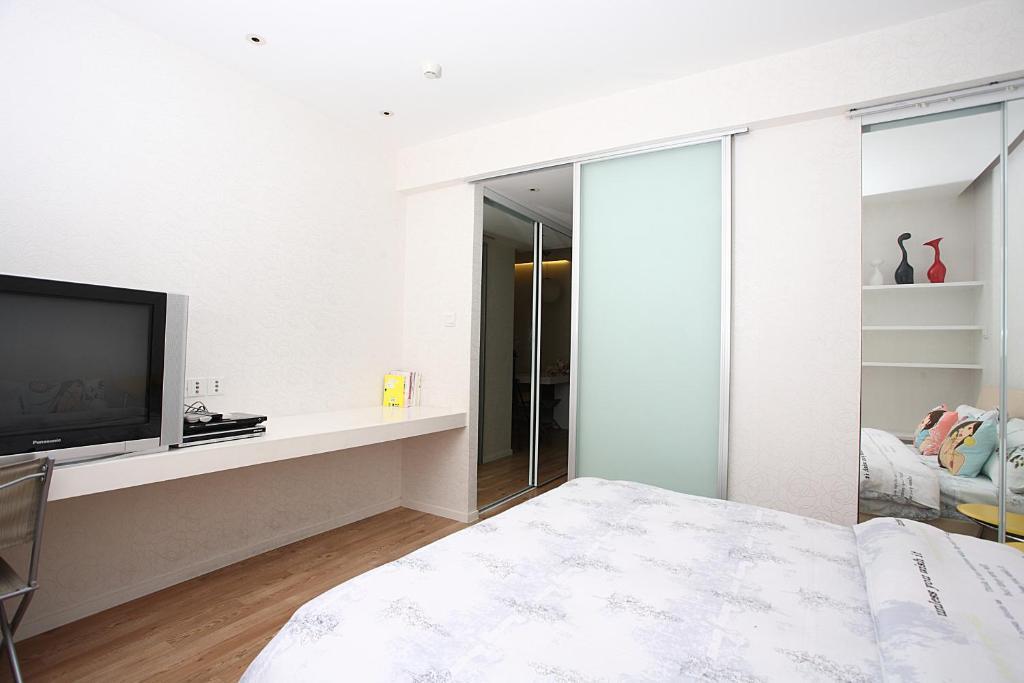 Homy Inns Mu Ma Nankín Habitación foto